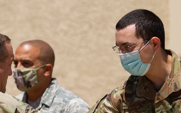 Adjutant General reenlists Airmen at 163d Attack Wing