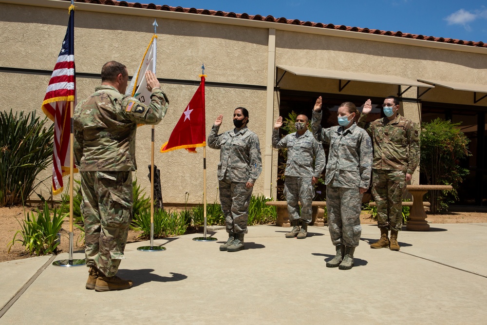 Adjutant General reenlists Airmen at 163d Attack Wing