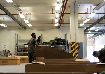 Keep it safe | U.S. Marines with CLR-37 store communications gear for safe-keeping