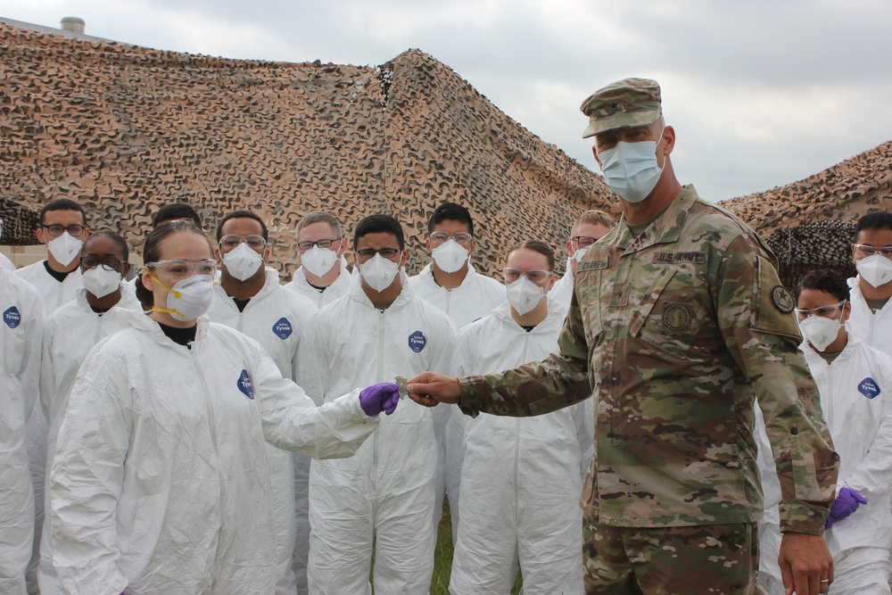 Brigadier General Greg Chaney Presents Texas Army National Guard Spc. Sylvia Ward
