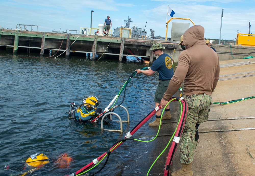 Navy Divers Conduct Training