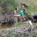 Natural-resources personnel conduct tributary habitat surveys at Fort McCoy