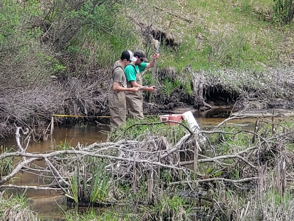 Natural-resources personnel conduct tributary habitat surveys at Fort McCoy