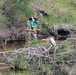 Natural-resources personnel conduct tributary habitat surveys at Fort McCoy