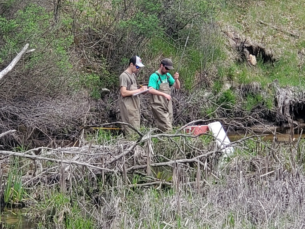 Natural-resources personnel conduct tributary habitat surveys at Fort McCoy