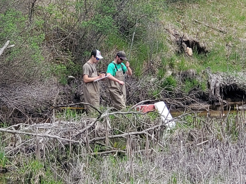 Natural-resources personnel conduct tributary habitat surveys at Fort McCoy