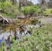 Natural-resources personnel conduct tributary habitat surveys at Fort McCoy