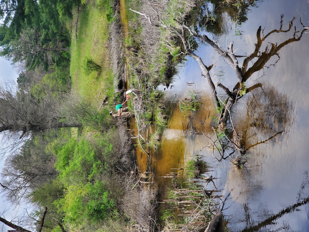 Natural-resources personnel conduct tributary habitat surveys at Fort McCoy