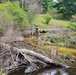 Natural-resources personnel conduct tributary habitat surveys at Fort McCoy