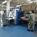 Naval Supply System Command Fleet Logistic Center Pearl Harbor prepares tri-wall postal packages for the Nimitz Carrier Strike Group