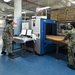 Naval Supply System Command Fleet Logistic Center Pearl Harbor prepares tri-wall postal packages for the Nimitz Carrier Strike Group