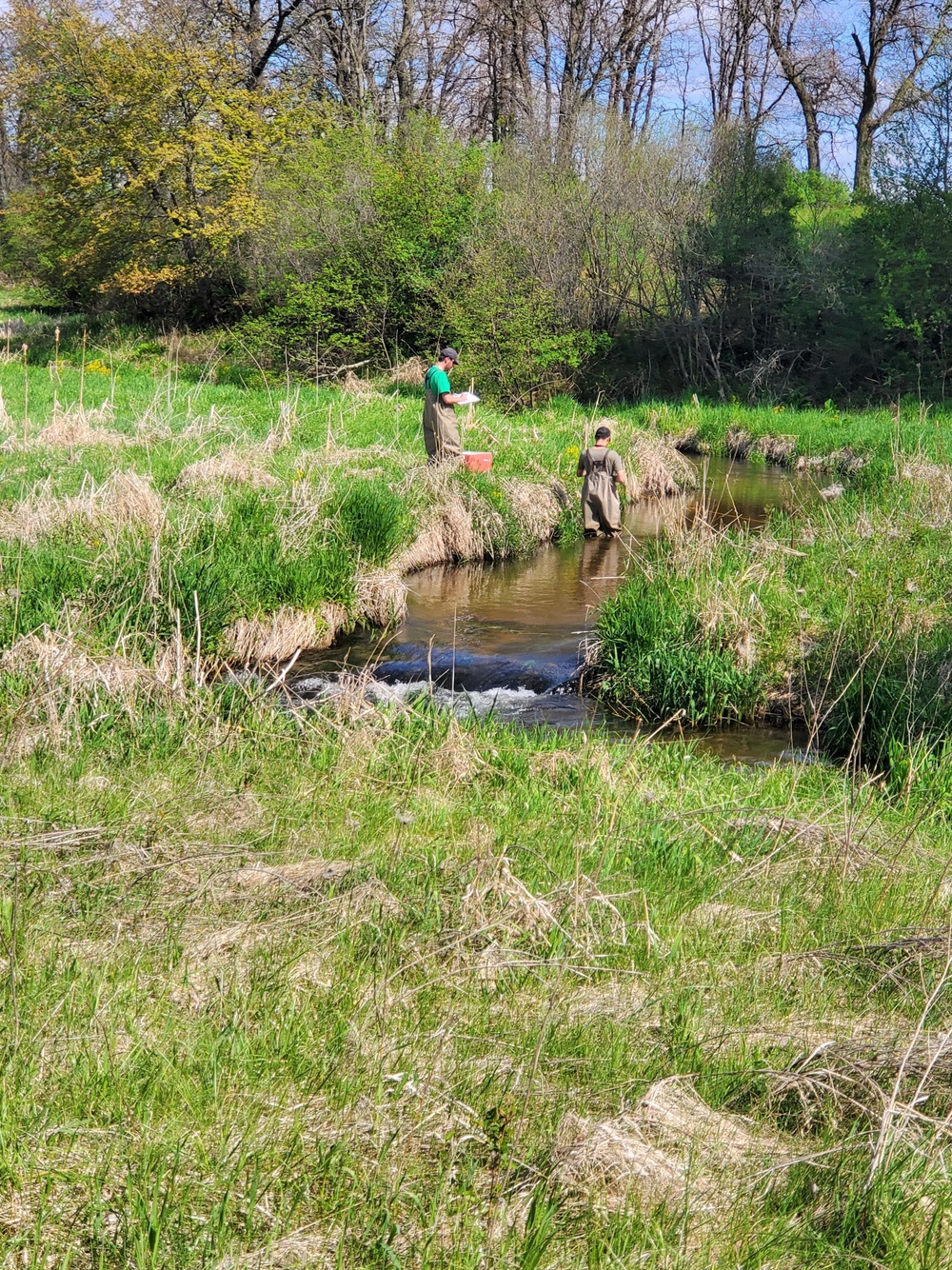 Natural-resources personnel conduct tributary habitat surveys at Fort McCoy