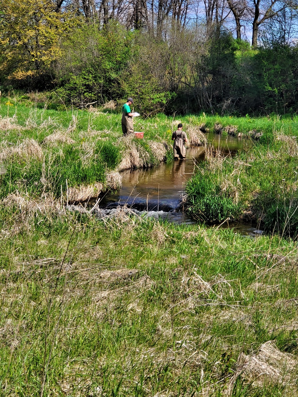 Natural-resources personnel conduct tributary habitat surveys at Fort McCoy