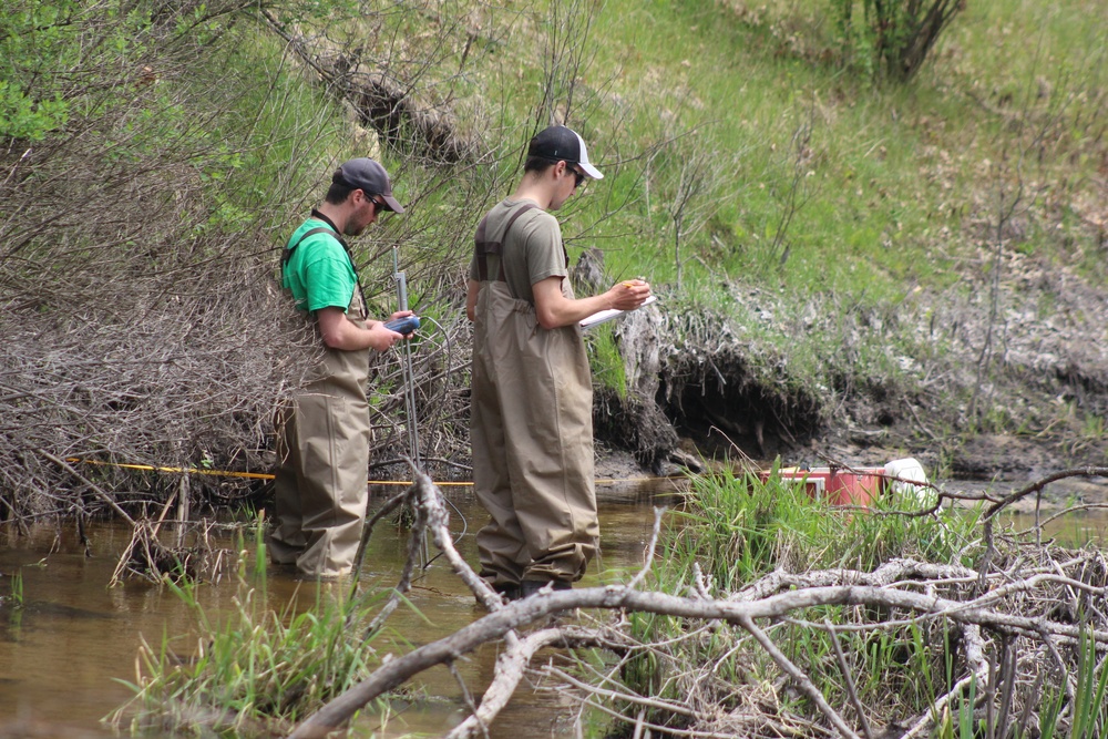 Natural-resources personnel conduct tributary habitat surveys at Fort McCoy