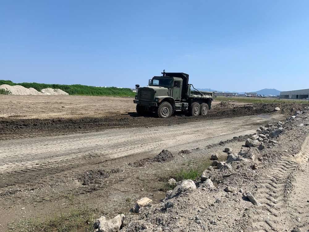 U.S. Navy Seabees with NMCB-5’s Detail Iwakuni support a landfill capping project at Marine Corps Air Station