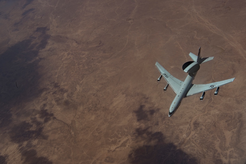 A U.S. Air Force KC-135 aircrew assigned to the 28th Expeditionary Air Refueling Squadron conducts an aerial refueling mission