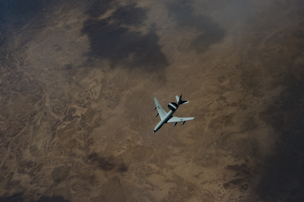 A U.S. Air Force KC-135 aircrew assigned to the 28th Expeditionary Air Refueling Squadron conducts an aerial refueling mission