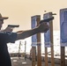 Sailors take part in a weapons qualification