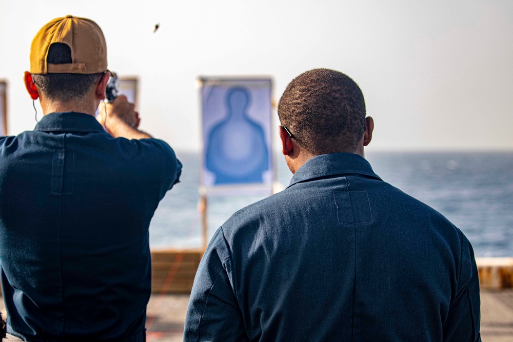 Sailors take part in a weapons qualification