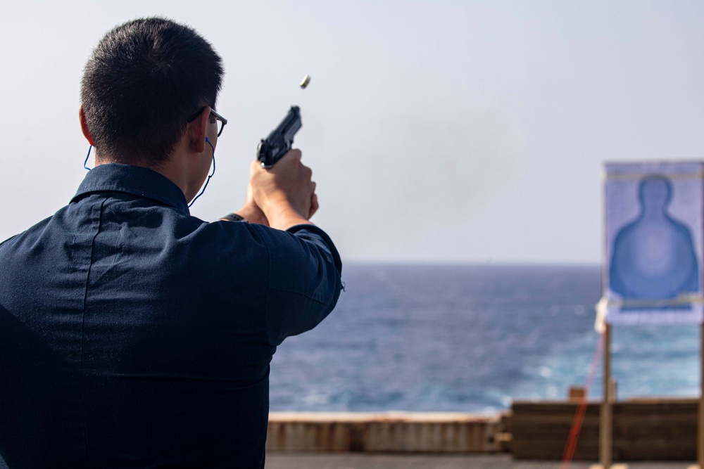 Sailors take part in a weapons qualification