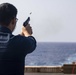 Sailors take part in a weapons qualification