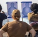 Sailors take part in a weapons qualification