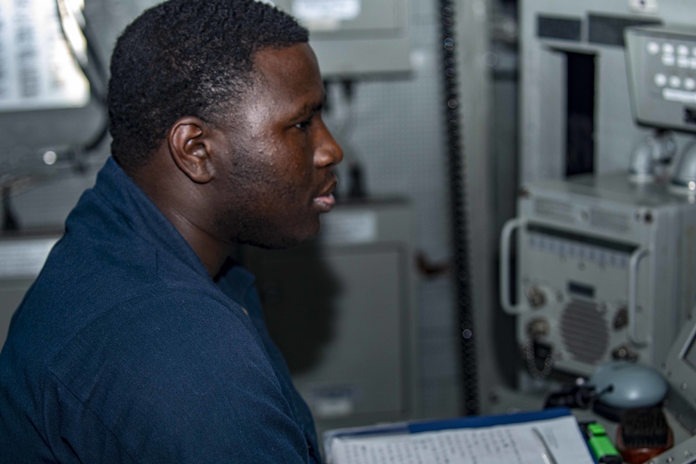 Sailors stand watch in combat