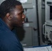 Sailors stand watch in combat