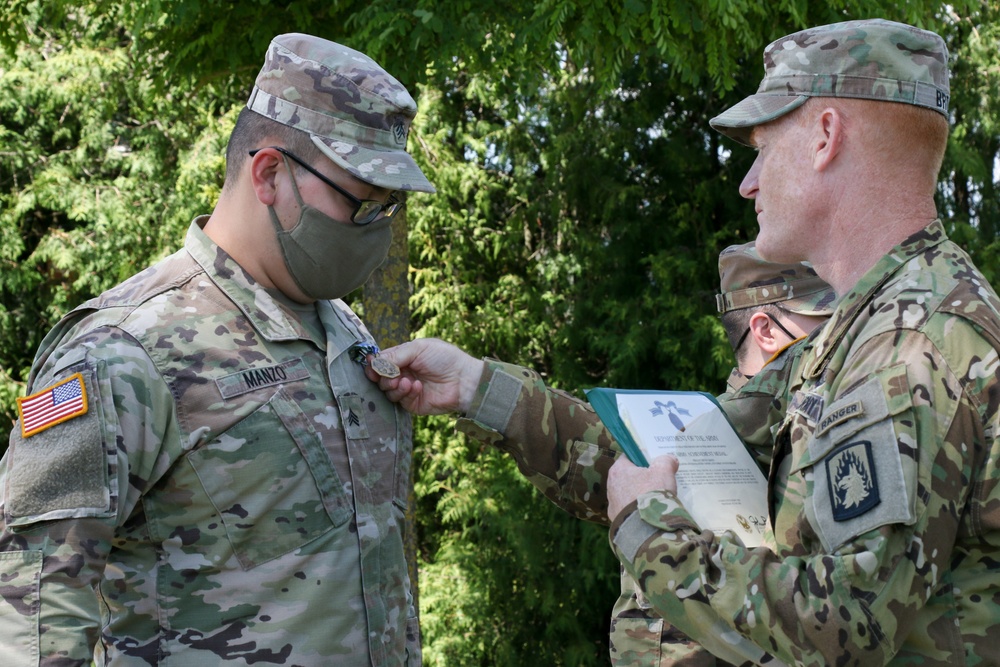 Col. John Broam recognize Soldiers for hard work, excellence