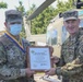Col. John Broam recognize Soldiers for hard work, excellence