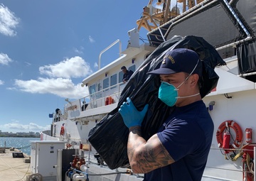 Coast Guard offloads $5.6 million in seized cocaine, transfers custody of 3 suspected smugglers in San Juan, Puerto Rico