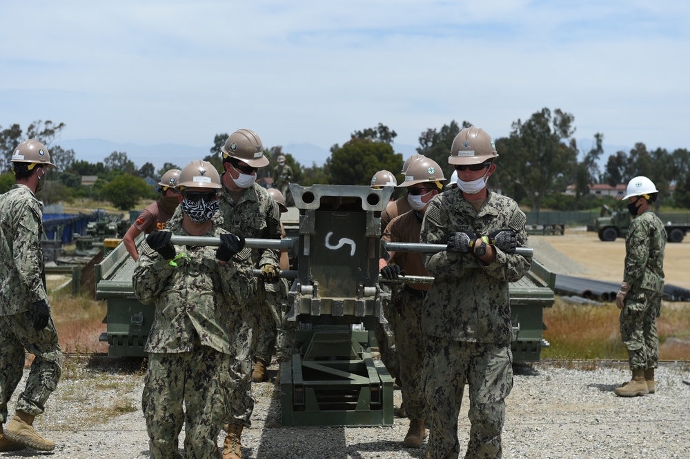 Seabees Construct a Medium Girder Bridge as part of Technical Exercise.