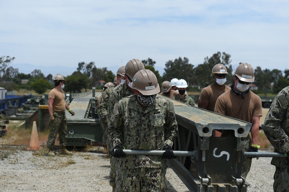 Seabees Construct a Medium Girder Bridge as part of Technical Exercise.