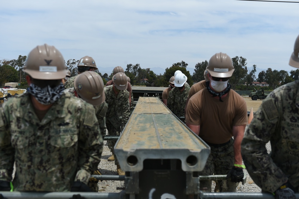 Seabees Construct a Medium Girder Bridge as part of Technical Exercise.