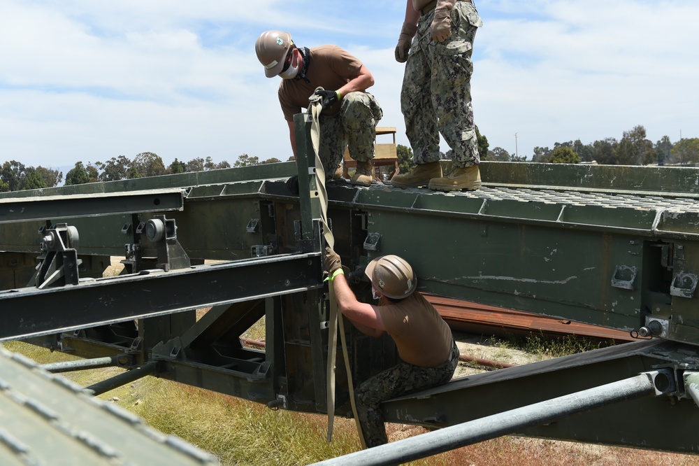 Seabees Construct a Medium Girder Bridge a part of Technical Exercise.