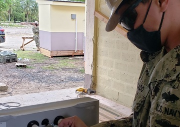 U.S. Navy Seabees with NMCB-5 build head and shower facilities for a COVID-19 response compound in Pohnpei
