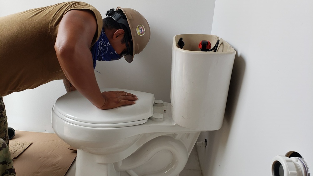 U.S. Navy Seabees with NMCB-5 build head and shower facilities for a COVID-19 response compound in Pohnpei