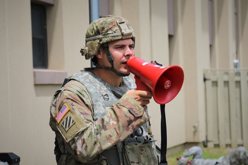 A 466th Medical Company NCO Motivates Soldiers During a MASCAL Exercise in Prepartion for the Units Upcoming Deployment