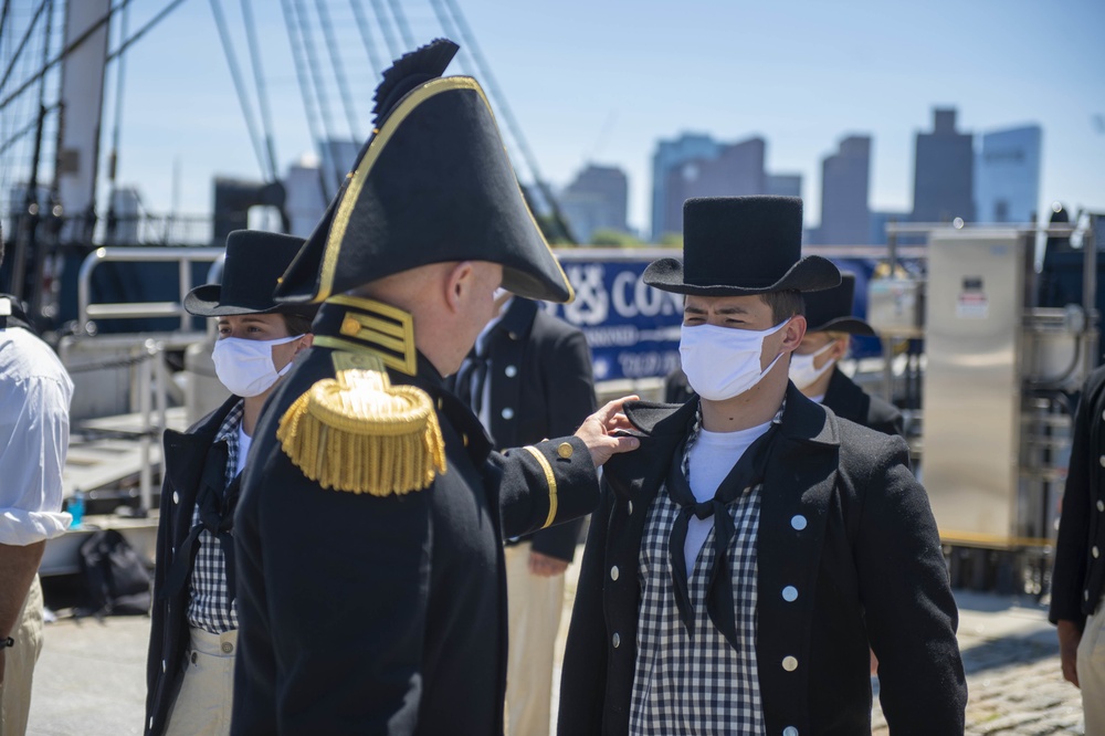 Airman Braidon Morrison is inspected by Cmdr. John Bena, Commanding Officer of USS Constitution