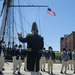 Commander John Benda, Commanding Officer of USS Constitution, talks with the crew