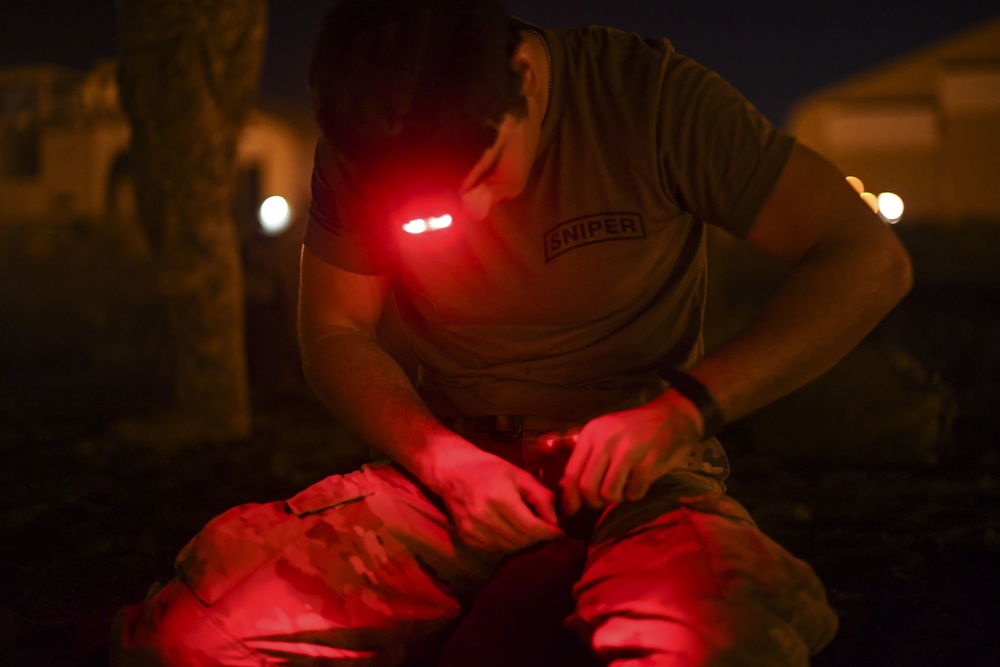 Task Force Guardian members conduct reconnaissance training at night