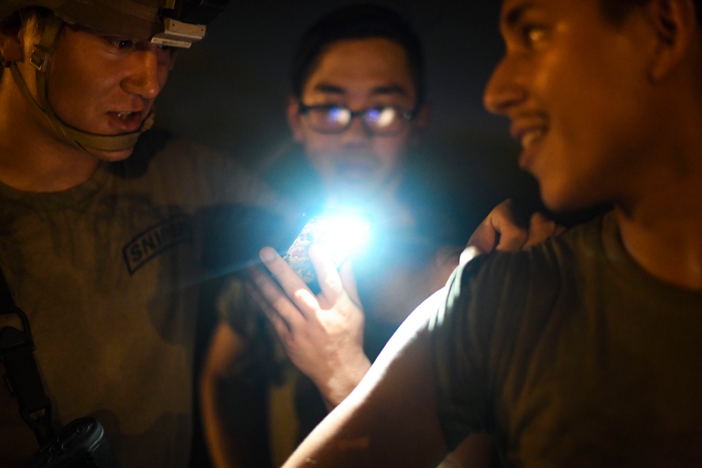 Task Force Guardian members conduct reconnaissance training at night