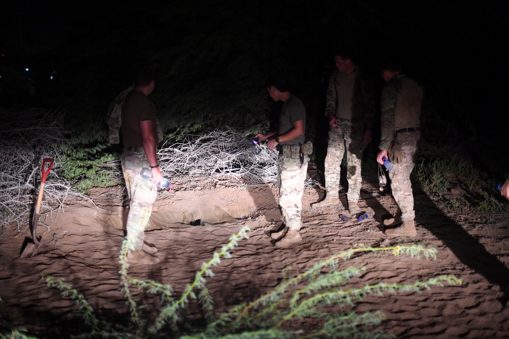 Task Force Guardian members conduct reconnaissance training at night