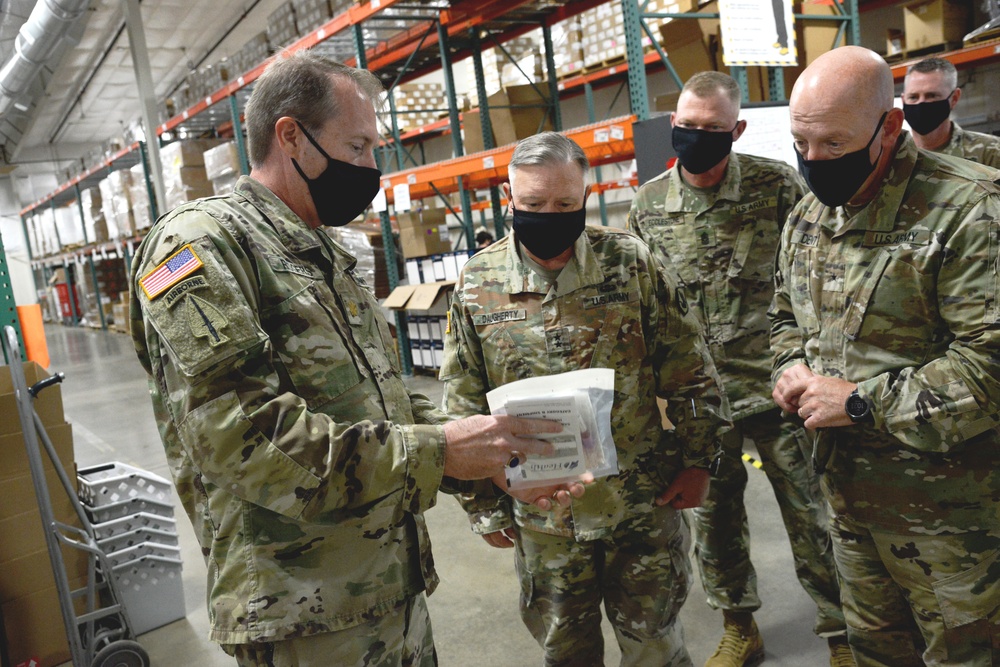 Bret D. Daugherty, Adjutant General, Washington State visits COVID-19 test kit assembly site