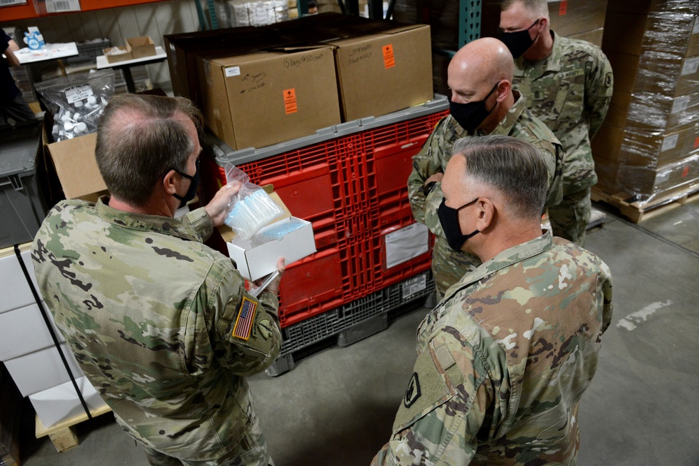 Bret D. Daugherty, Adjutant General, Washington State visits COVID-19 test kit assembly site