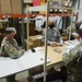 Bret D. Daugherty, Adjutant General, Washington State visits COVID-19 test kit assembly site