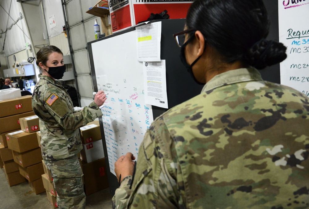 Bret D. Daugherty, Adjutant General, Washington State visits COVID-19 test kit assembly site