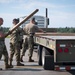 354th LRS help 2nd LRS unload equipment