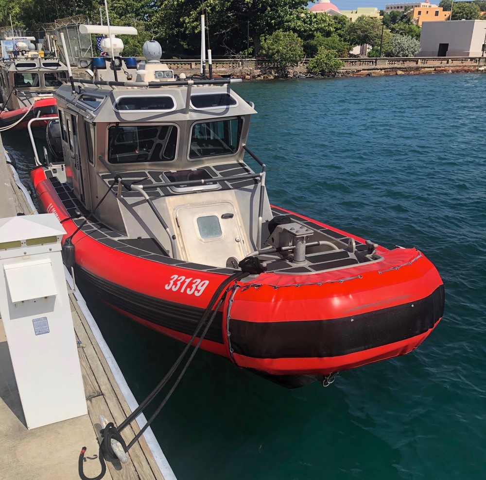 Coast Guard boat crew rescues 2 watercraft riders off Isla Verde Beach in Carolina, Puerto Rico