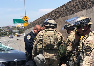 Cal Guard's 1-185th Soldiers respond to car wreck during civil unrest mission